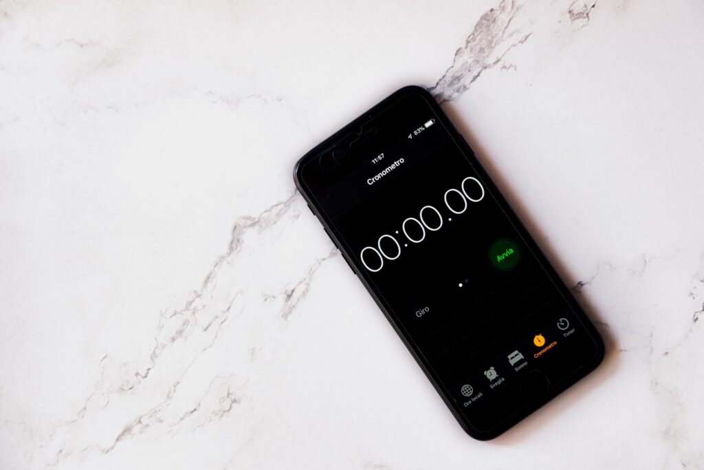 Stopwatch running on a smartphone, the load time a homeowner waits through
