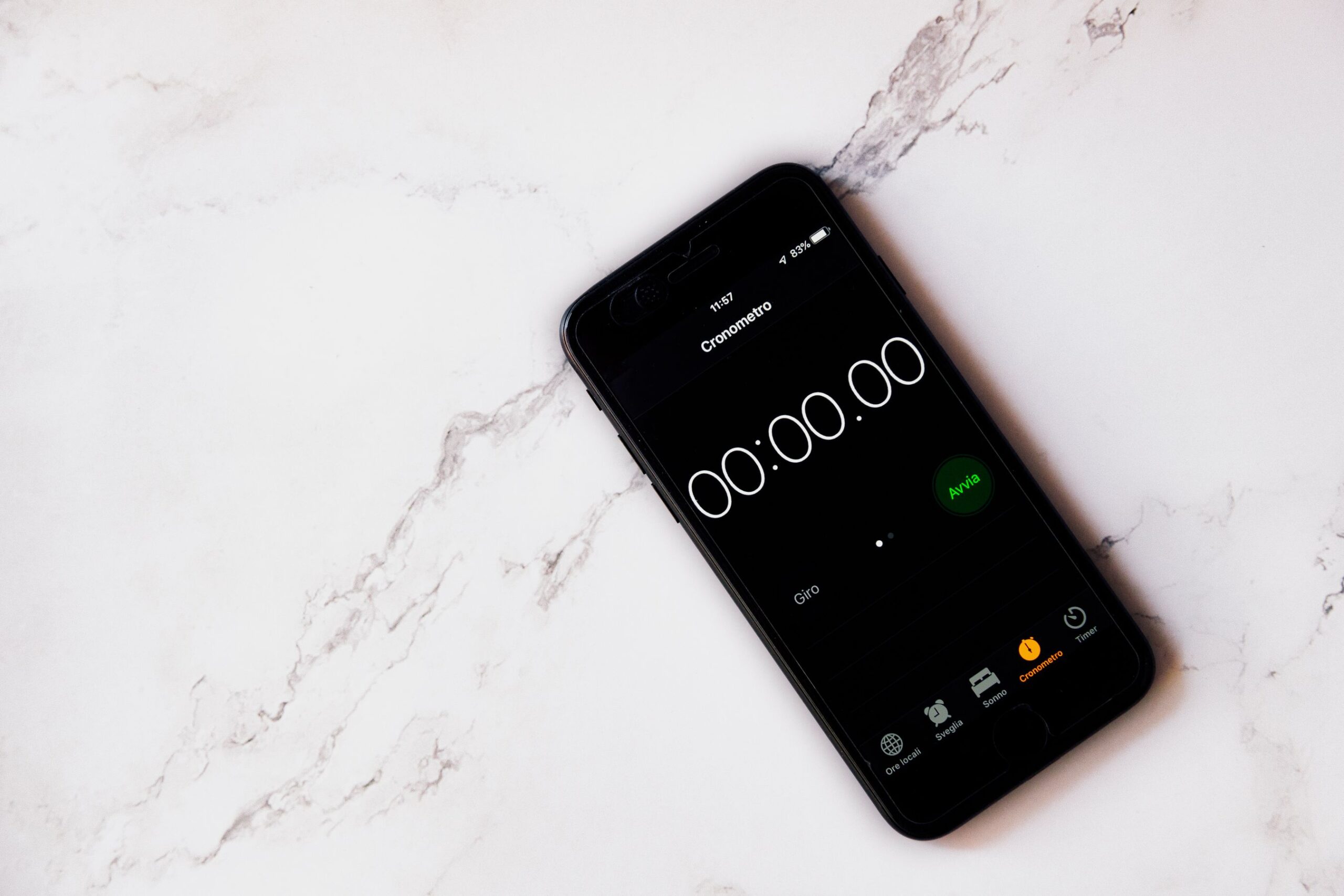 Stopwatch running on a smartphone, the load time a homeowner waits through
