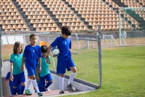 Youth soccer team walking onto the field, the kind of sponsorship that earns local links
